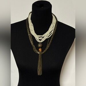 Elegant Multi-Strand Pearl and Gold Necklace with Tassel Pendant